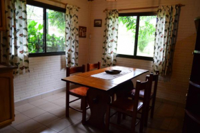 Гостиница Oasis Bed and Breakfast  Пуэрто-Игуасу